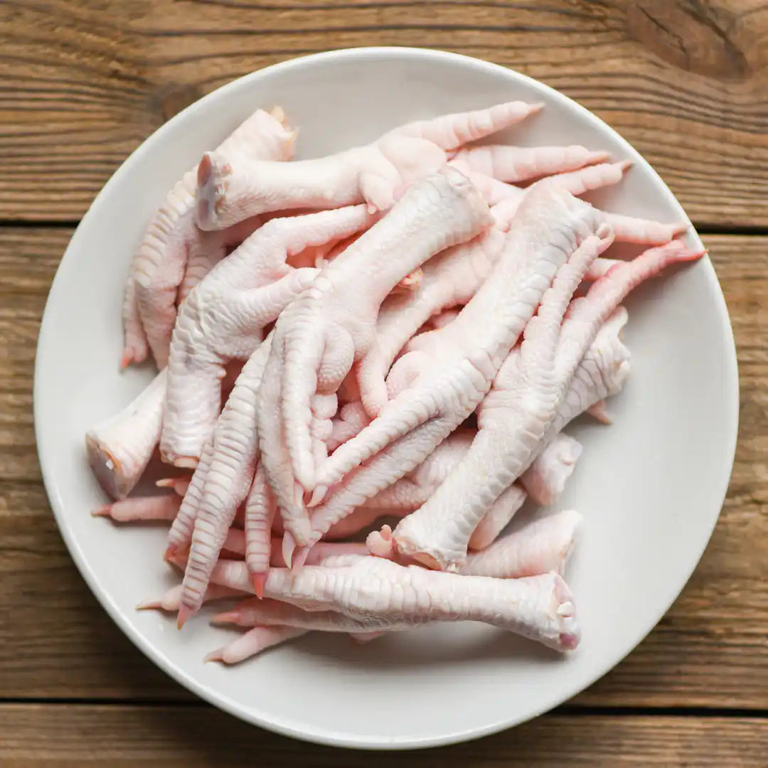 Certified organic chicken's feet close-up.