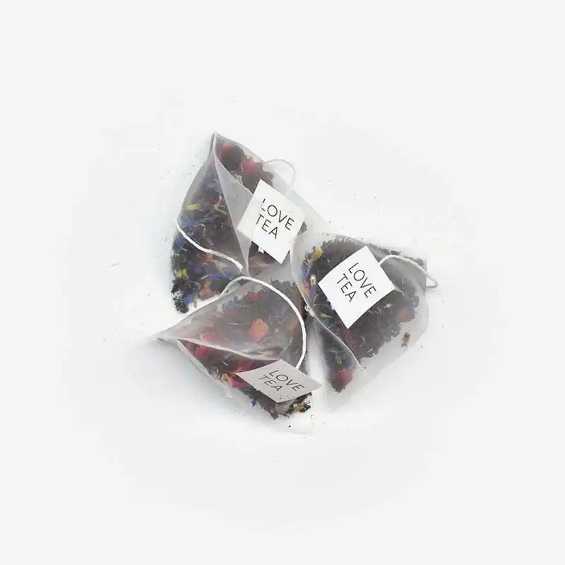 French Earl Grey Tea pyramid bags on a white background.