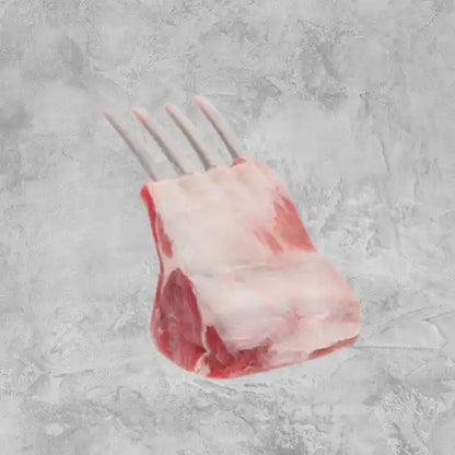 Chilled Frenched lamb rack, cap off, plated.