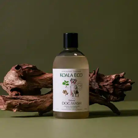 Koala Eco Natural Dog Wash bottle with dog being washed.