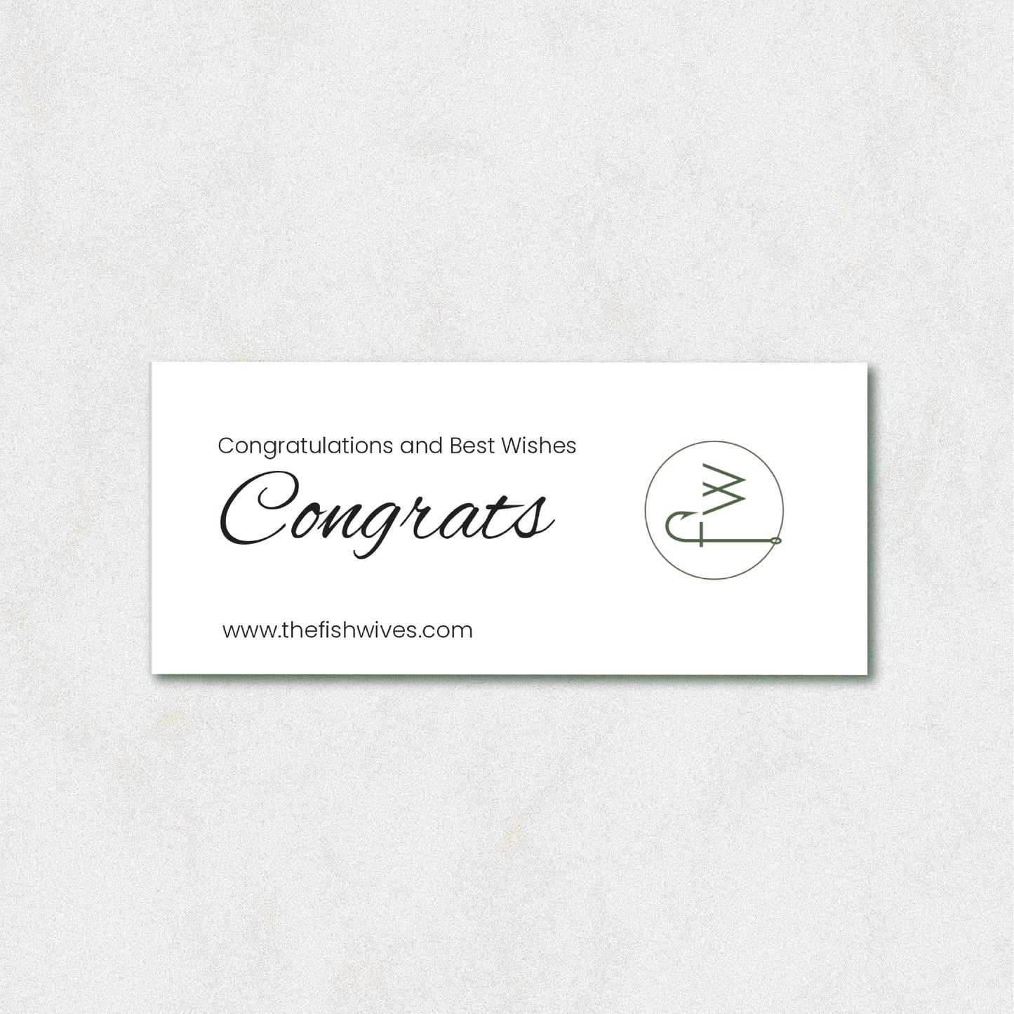 A white rectangular congratulations card with elegant black text reading 'Congratulations and Best Wishes Congrats' and the website 'www.thefishwives.