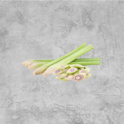 Fresh lemongrass stalks on a light background.