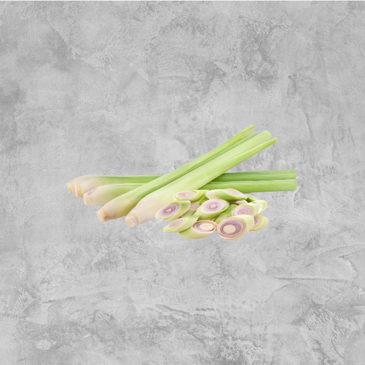 Fresh lemongrass stalks on a light background.