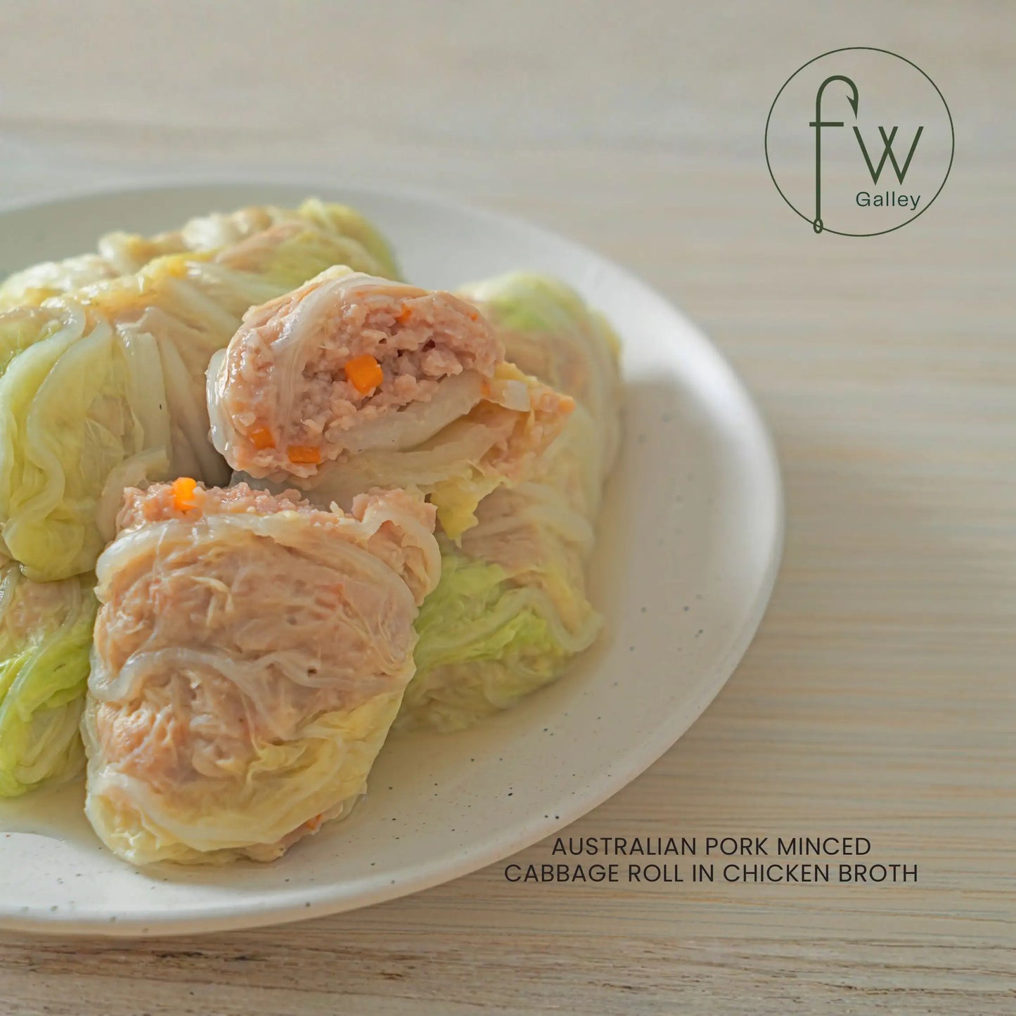 Cabbage roll dish on a plate with 'fw Galley' branding
