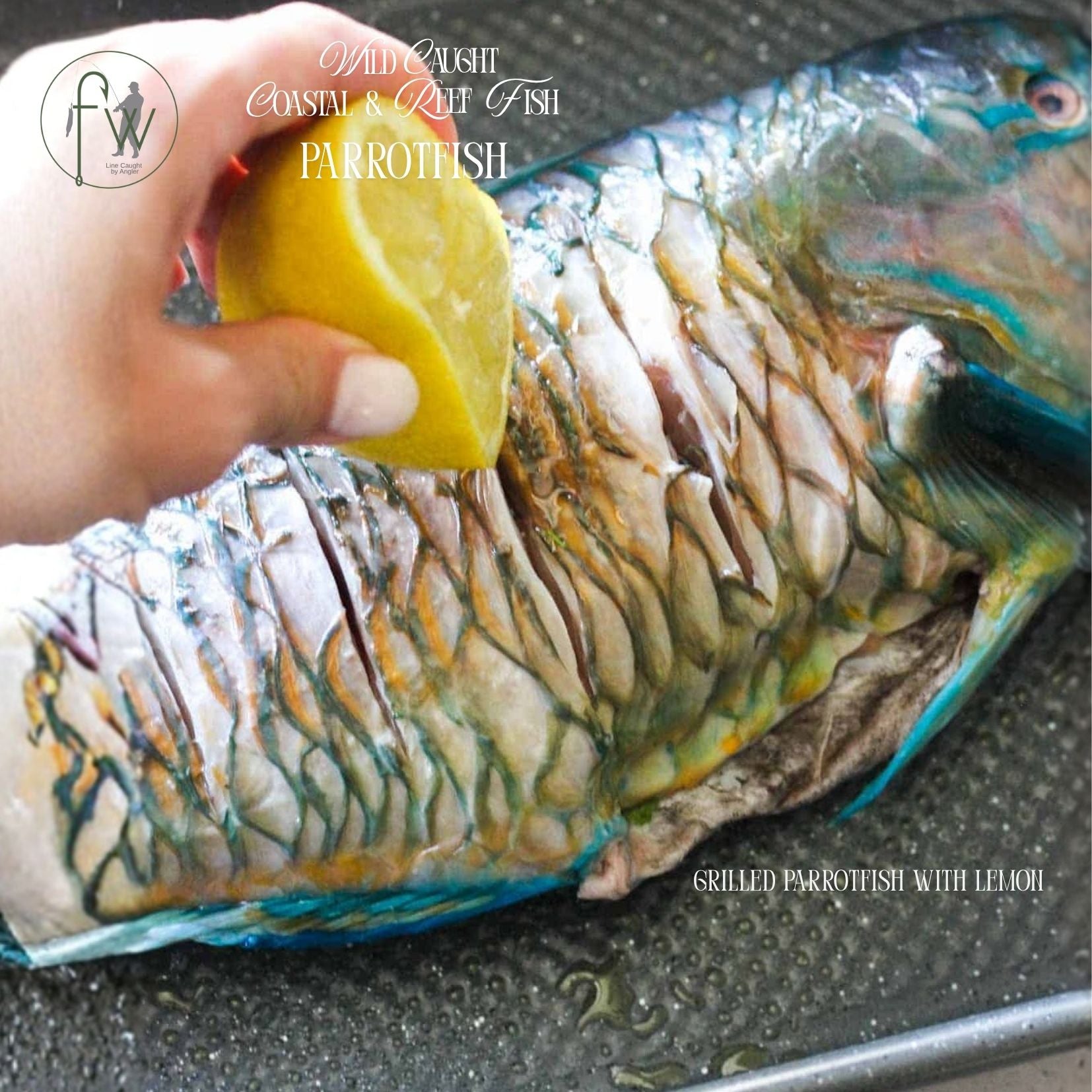 Grilled parrotfish with lemon on a pan, with a hand holding the lemon.
