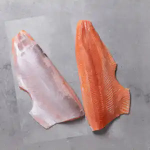 New Zealand King Salmon side, skin off, on a light background.