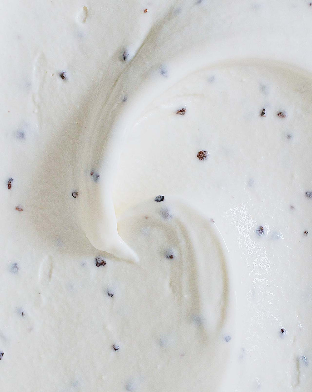 Scoop of Honey & Roasted Cocoa Nibs ice cream, Apiary Singapore.