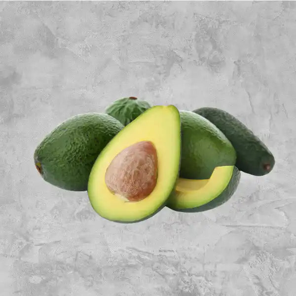 Fresh Australian avocado on a light background.