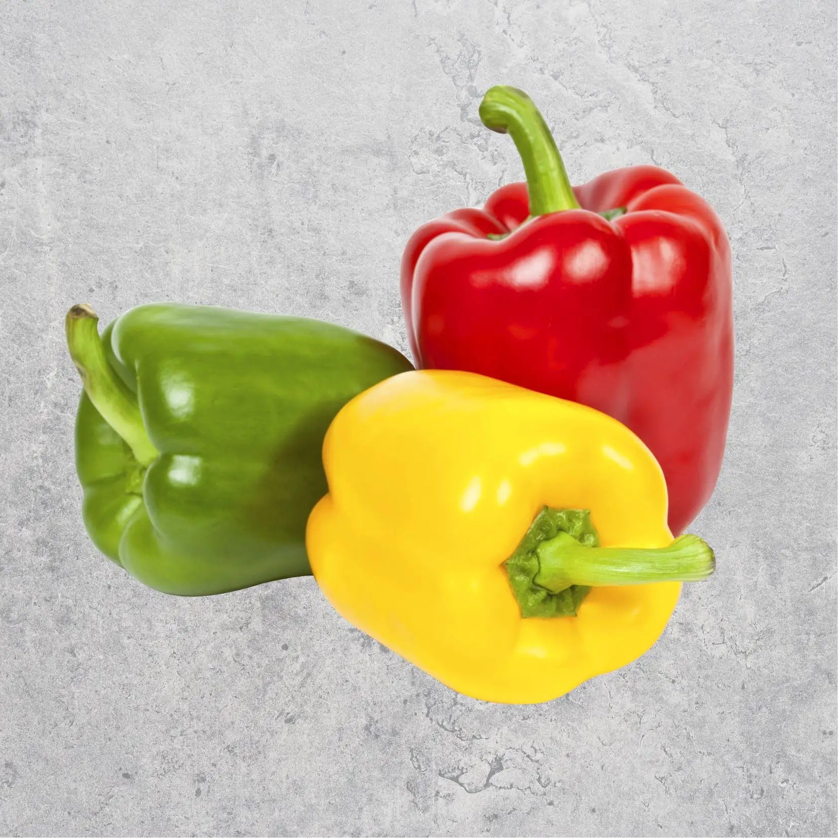 Baby mixed capsicum, three colours, on a light background.