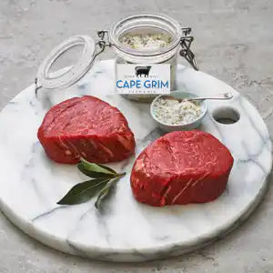 Cape Grim grass-fed beef eye fillet steak on a light background.
