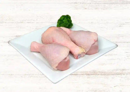 Certified organic chicken drumsticks close-up.