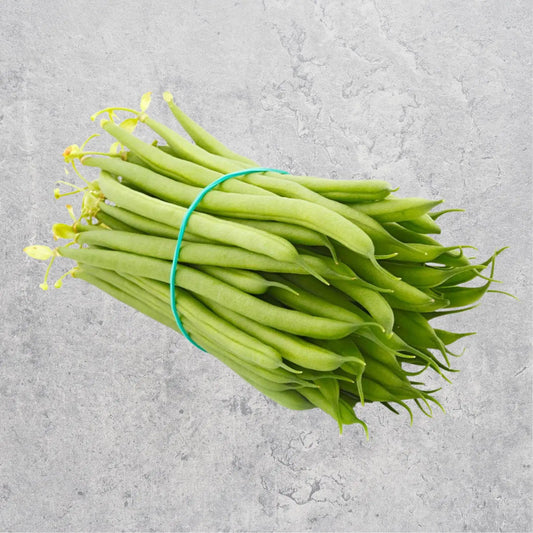Fresh haricot green beans on a light background.