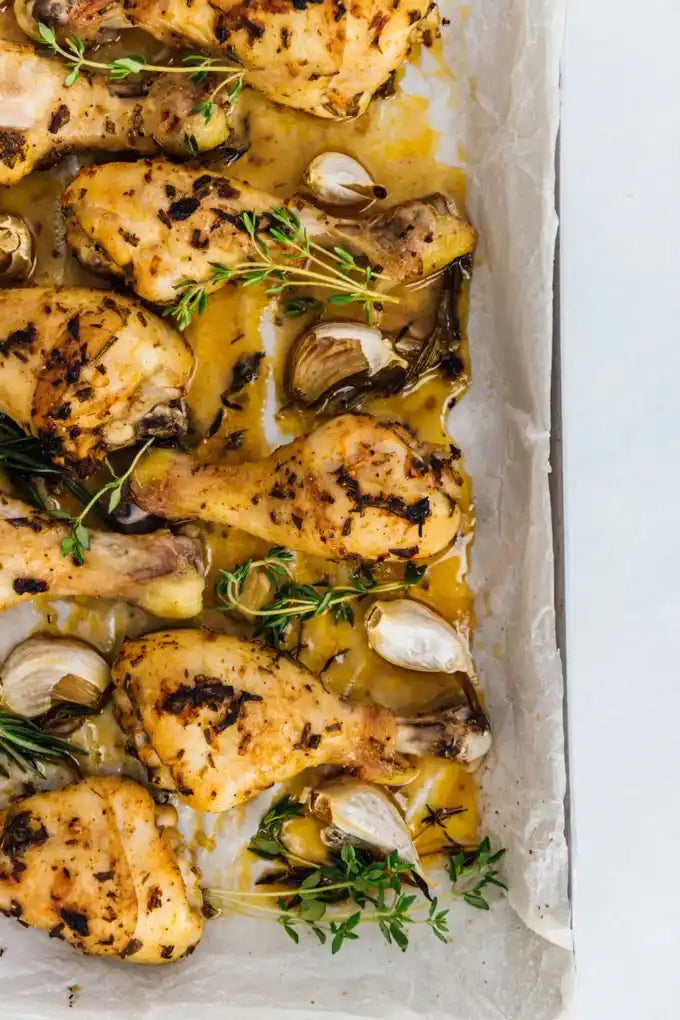 Lemon and garlic marinated chicken drumsticks in packaging.