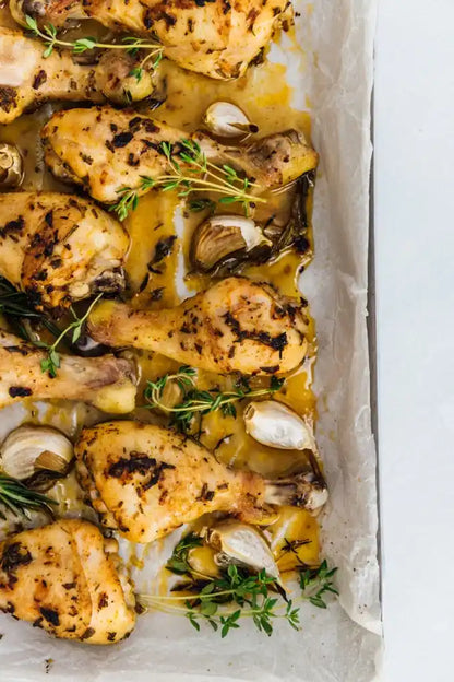 Lemon and garlic marinated chicken drumsticks in packaging.