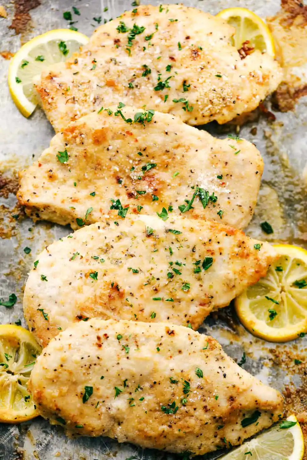Parmesan marinated chicken breast in packaging.