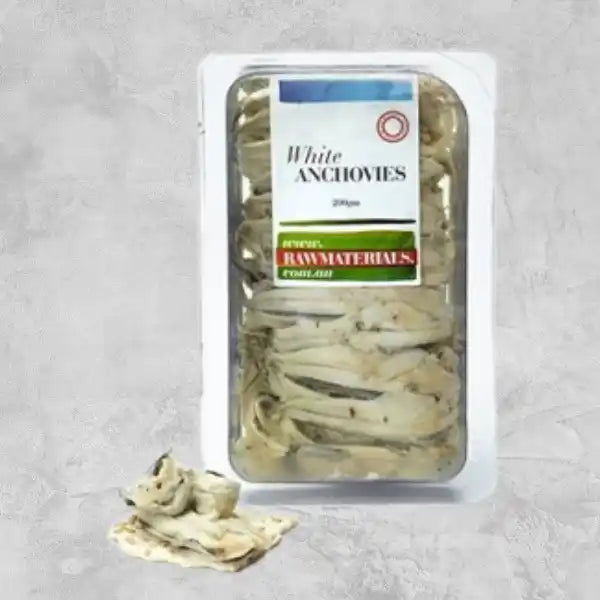 Raw Materials white anchovies on a light background.